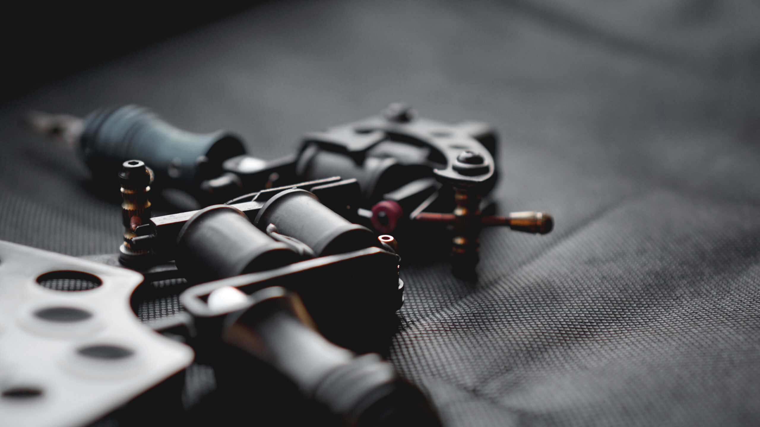 Tattoo artist at work — Apex Tattoo Studio Conway AR